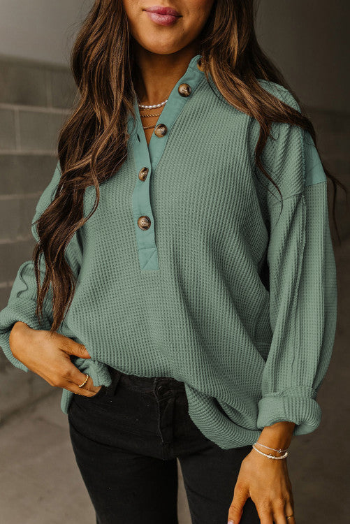 Smoke green tunic with pockets fits like an XL
